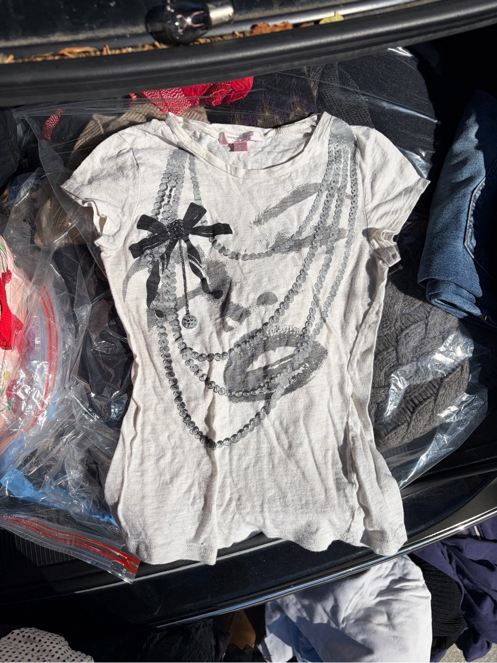 Romeo & Juliet Couture White Tee with Necklace & Bow Print